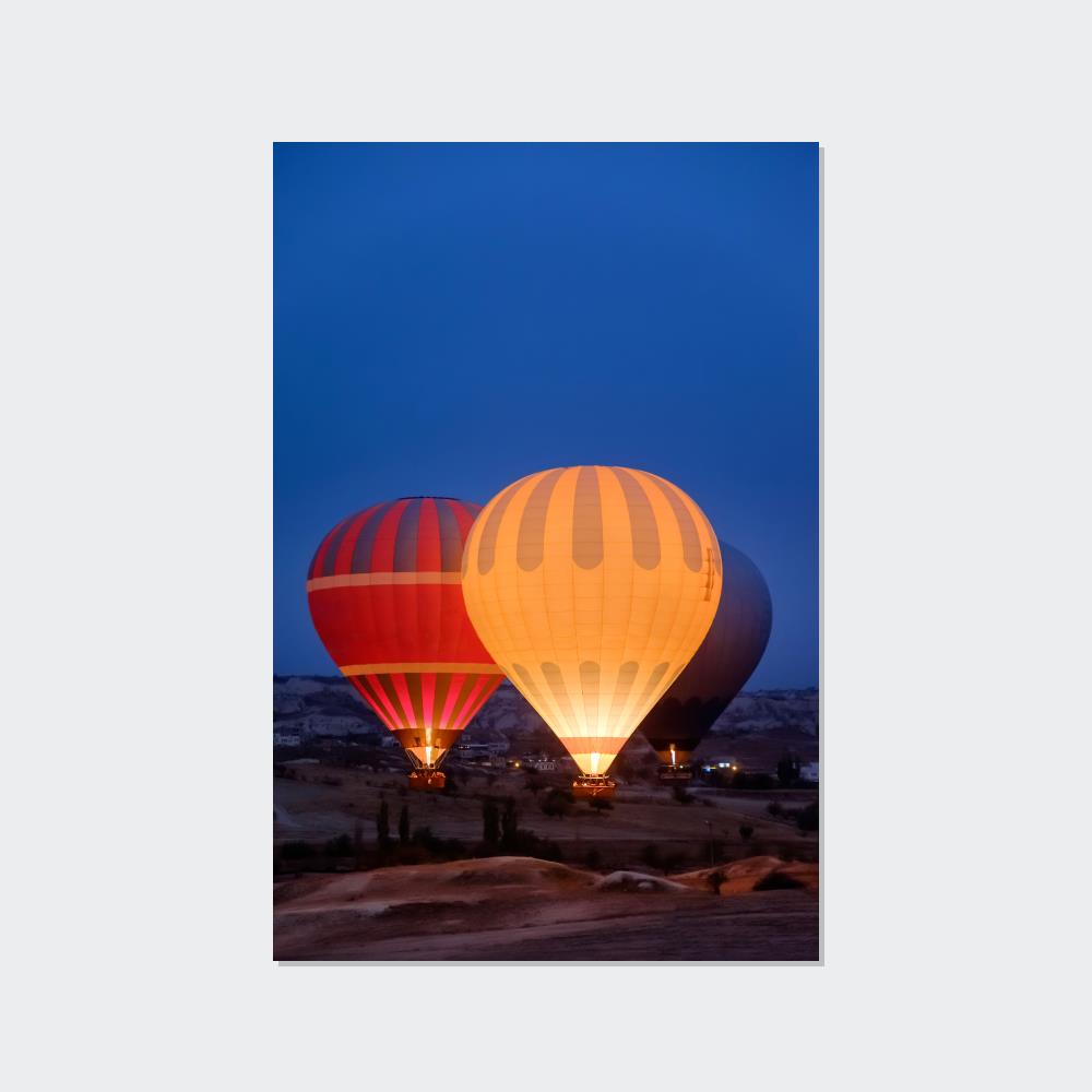 Aerial Adventure: Framed Canvas & Poster of a Hot Air Balloon Over Mountains
